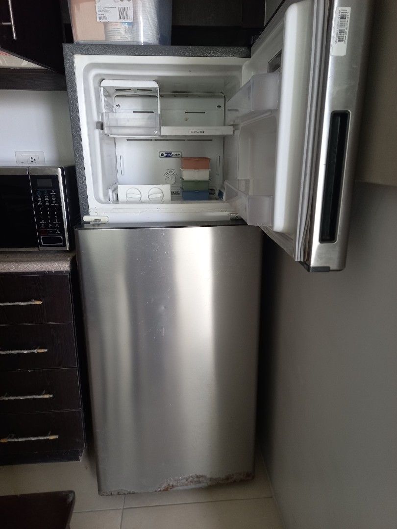 Whirlpool Stainless Steel Refrigerator (Category: Refrigerators and Freezers) located in Paranaque City. Submitted by janmar02 (Listing ID 1444942859, Image 2). Description: - Whirlpool Top Freezer Refrigerator - Sleek Stainless Steel Finish - Ample Storage Space for Groceries - Fully Functional and Works Well - Minor Scuffs from Normal Use - Ready for a New Home.