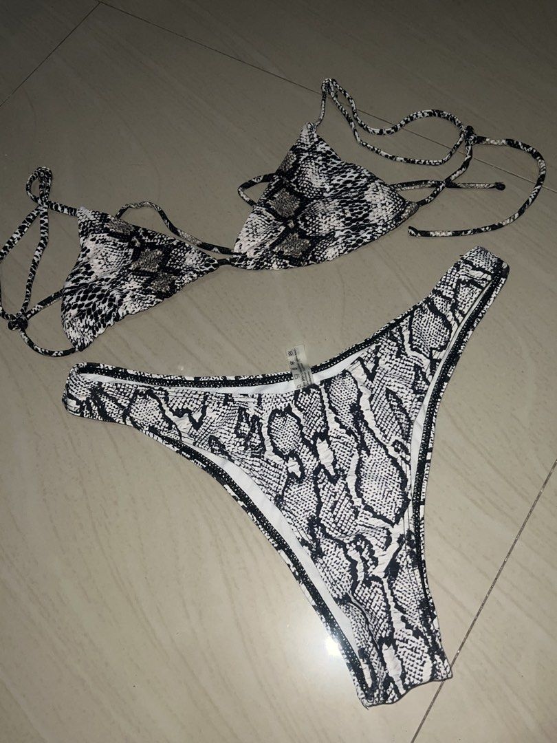 zaful bikini snake print set || old money, chic, classic (Category: Bikinis & Swimsuits) located in Las Pinas. Submitted by st4rbeam (Listing ID 1445007732, Image 3). Description: - Trendy snake print two-piece bikini set - Adjustable ties at the neck and back for a custom fit - Matching bikini bottoms included - Ideal for beach days, pool parties, or vacations - Comfortable and fashionable design.