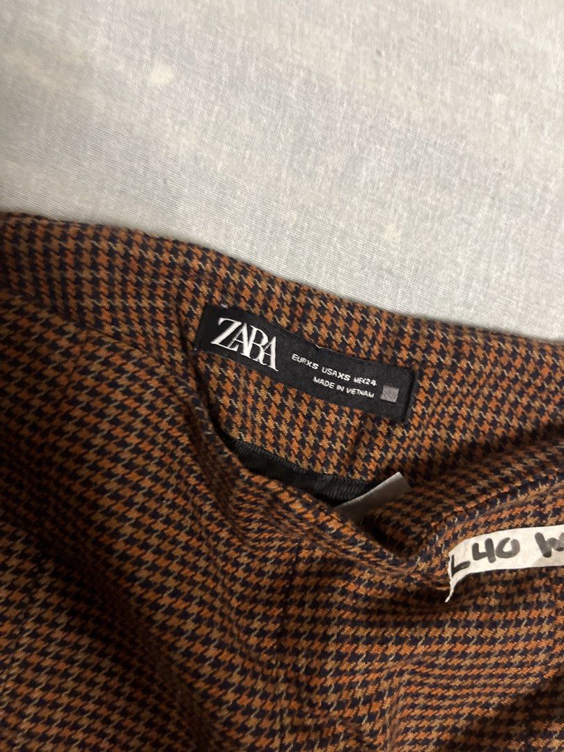 Zara Brown Plaid High Waisted Pants (Category: Other Bottoms) located in Manila. Submitted by gabriyelo (Listing ID 1445028486, Image 2). Description: - Zara Brown Plaid Pants - High-waisted fit - Slim leg silhouette - Houndstooth-like pattern - Versatile for dressing up or down - Comfortable fabric - Size XS.