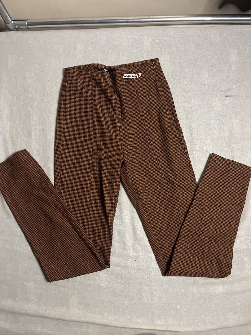 Zara Brown Plaid High Waisted Pants (Category: Other Bottoms) located in Manila. Submitted by gabriyelo (Listing ID 1445028486, Image 1). Description: - Zara Brown Plaid Pants - High-waisted fit - Slim leg silhouette - Houndstooth-like pattern - Versatile for dressing up or down - Comfortable fabric - Size XS.