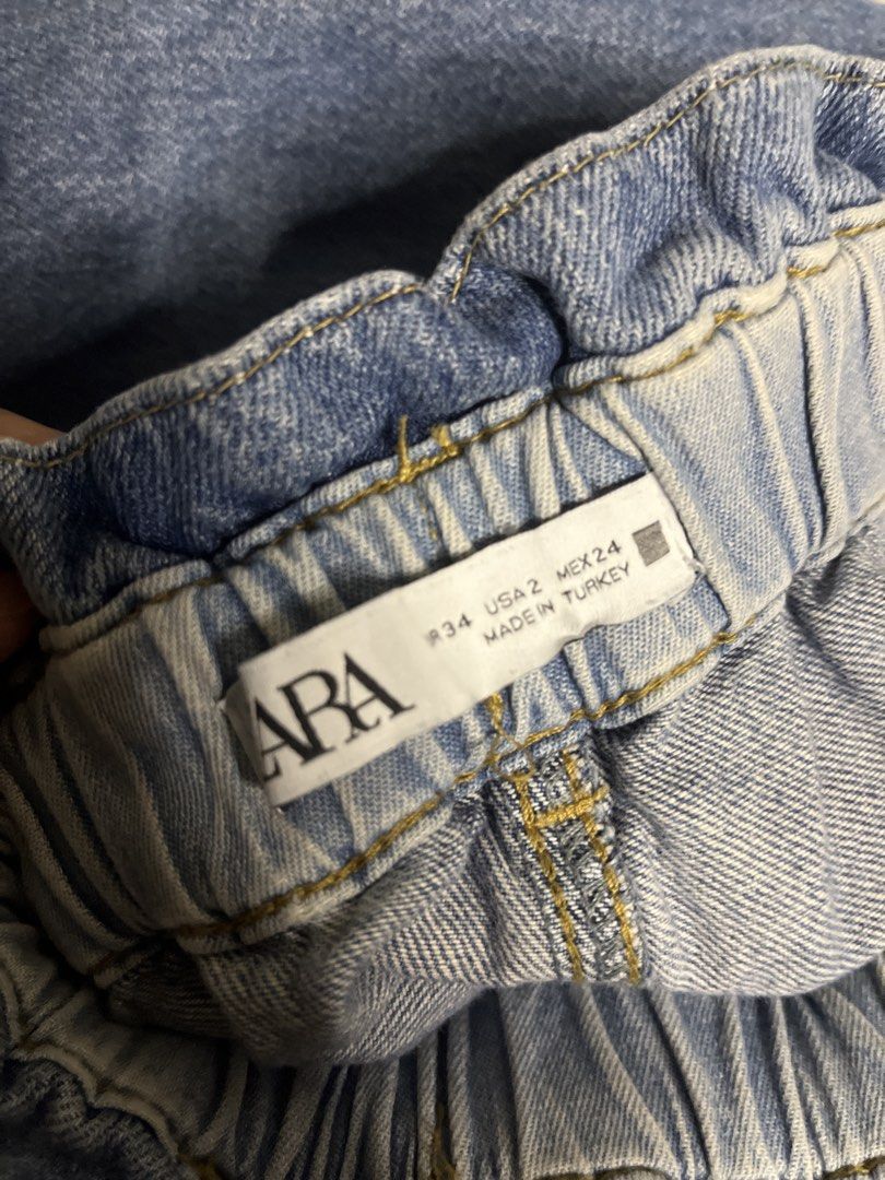 Zara High Waisted Paperbag Jeans (Category: Jeans) located in Manila. Submitted by gabriyelo (Listing ID 1445027689, Image 3). Description: - Zara Blue Denim Jeans - High-waisted with paperbag waist - Elasticated waistband for comfort - Straight leg fit - Two back pockets - Made in Turkey - Ideal for casual wear.