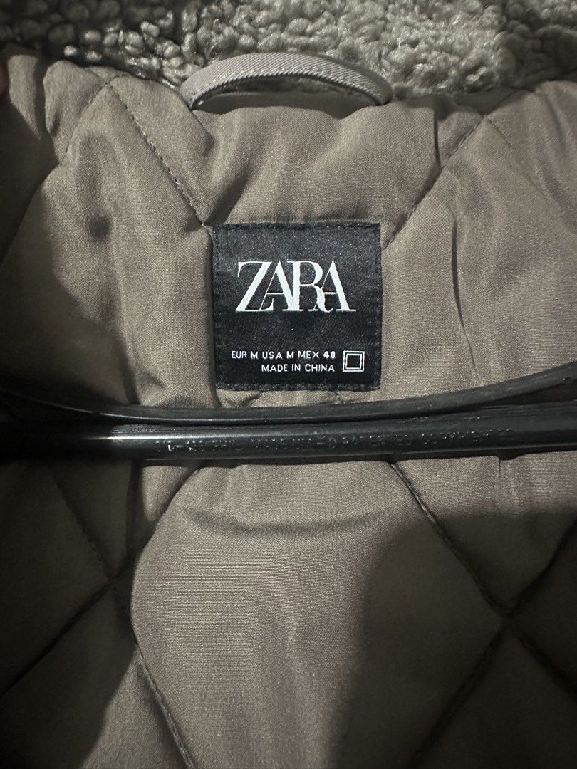 Zara Men's Padded Jacket with Sherpa Collar (Category: Coats, Jackets and Outerwear) located in Quezon City. Submitted by bart.anonuevo (Listing ID 1444892993, Image 3). Description: - Zara jacket in light beige - Size: Medium - Features warm quilted lining - Soft sherpa collar for extra comfort - Full zip front closure - Convenient pockets - Ideal for cooler weather Used only once on Hong Kong.