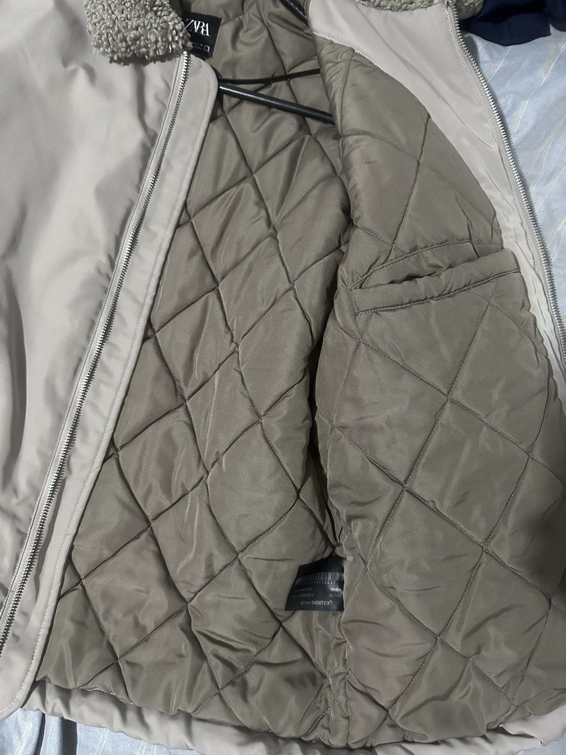 Zara Men's Padded Jacket with Sherpa Collar (Category: Coats, Jackets and Outerwear) located in Quezon City. Submitted by bart.anonuevo (Listing ID 1444892993, Image 2). Description: - Zara jacket in light beige - Size: Medium - Features warm quilted lining - Soft sherpa collar for extra comfort - Full zip front closure - Convenient pockets - Ideal for cooler weather Used only once on Hong Kong.