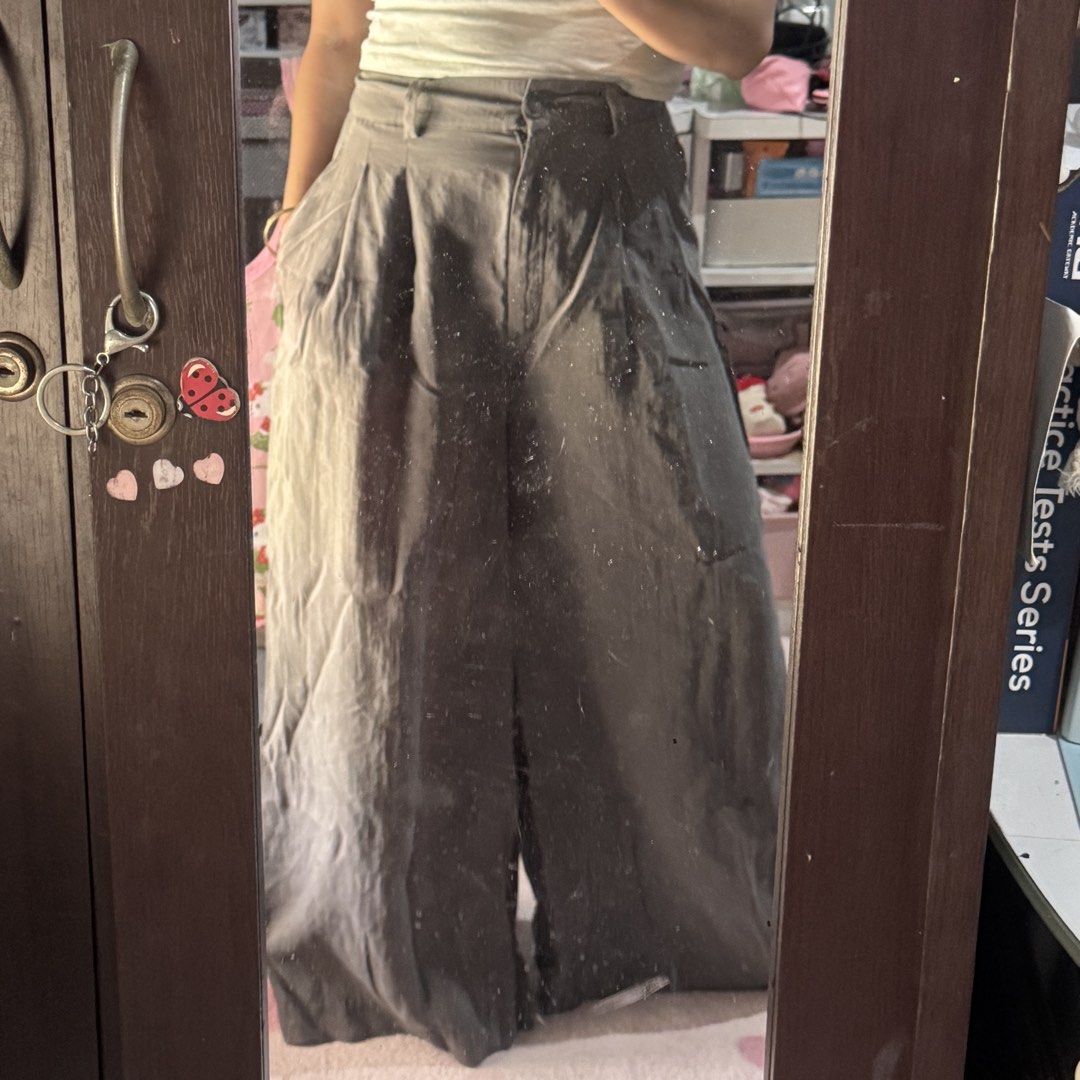 Zara Wide Leg Pleated Pants Grey (Category: Other Bottoms) located in Marikina City. Submitted by prelovedsms (Listing ID 1444905966, Image 3). Description: Zara grey wide leg pants. High waisted with pleats, belt loops, and button closure. Length: 39 inches Waist: 26 Height: 5’3 .