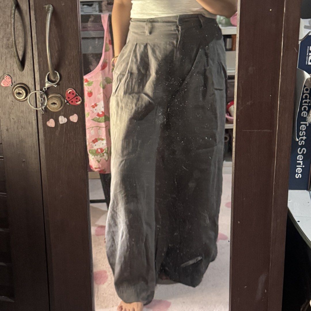 Zara Wide Leg Pleated Pants Grey (Category: Other Bottoms) located in Marikina City. Submitted by prelovedsms (Listing ID 1444905966, Image 2). Description: Zara grey wide leg pants. High waisted with pleats, belt loops, and button closure. Length: 39 inches Waist: 26 Height: 5’3 .
