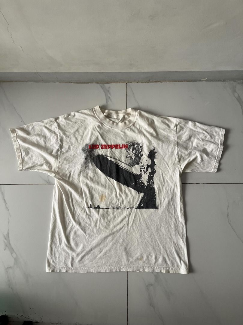 1984 Led Zeppelin Promo by Myth Gem Ltd. (Category: Tshirts & Polo Shirts ) located in Manila. Submitted by thrift.psd (Listing ID 1445170486, Image 2). Description: 1984 Led Zeppelin Promo by Myth Gem Ltd. Cut tag Some distressing (repaired slice, yellow stain, small slice) No size on tag Length: 28in Width: 22in.