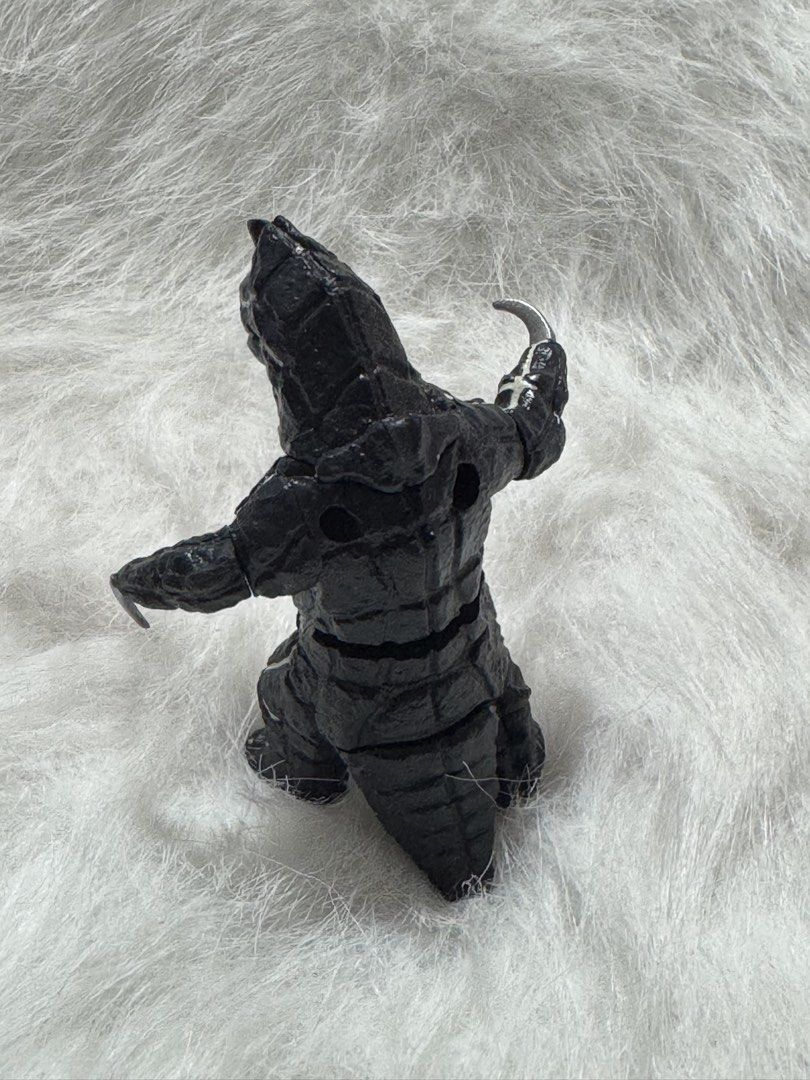 A2 Bandai Ultra Monster Series soft vinyl figure of the monster Dorako (Category: Figurines & Statues) located in Angeles City. Submitted by zyeplustradings (Listing ID 1445054018, Image 2). Description: Bandai Ultra Monster Series soft vinyl figure of the monster Dorako It is specifically identified as Ultra Monster #50 in the line, often referred to as a “Spark Doll” due to the live sign on its foot. The figure features a distinct black body wi