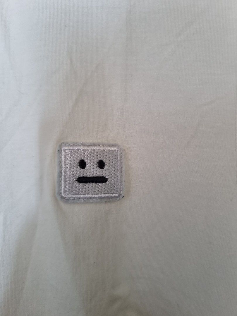 Acne Studios White Face Patch T-Shirt (Category: Luxury Apparel) located in Manila. Submitted by solotrifting (Listing ID 1445095175, Image 2). Description: - Acne Studios white t-shirt - Iconic face patch on chest - Size: L - Made in Portugal.
