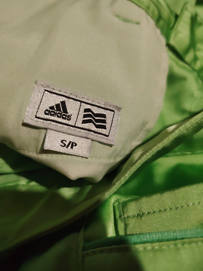 Adidas Green Athletic Shorts S/P (Category: Shorts) located in Luisiana. Submitted by sahayamay77 (Listing ID 1445110803, Image 3). Description: - Bright green Adidas shorts - Shiny material, great for sports or casual wear - Embroidered Adidas logo on the side - Size S/P - Front and back pockets - Feel free to ask any questions!.