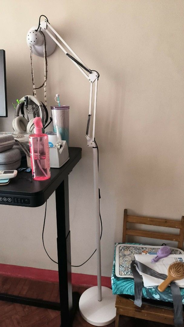 Floor Lamp - white (Category: Lighting) located in Quezon City. Submitted by maki.chan0129 (Listing ID 1445084590, Image 2). Description: - White adjustable floor lamp - Stands approximately 180cm tall - Flexible arm and head for precise light positioning - Stable and round base (28cm wide) - Lamp head is about 15.5cm wide - Ideal for reading or task lighting - no issues. makinis po walang dent or paint chipping. wires are all great. rfs - will u