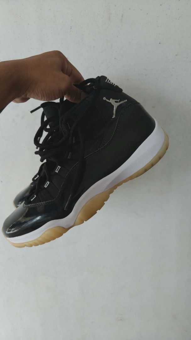 Air Jordan 11 Retro "Concord" (Category: Sneakers) located in Consolacion. Submitted by friendlyp86374 (Listing ID 1445068605, Image 2). Description: - Iconic Air Jordan 11 jubilee colorway - Classic black patent leather with white accents - Signature icy translucent soles - US Men's Size 9.5mens - Perfect for collectors and everyday style - Condition as shown in photos.