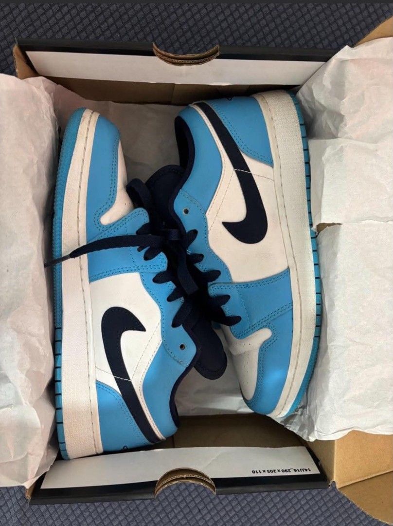 Air Jordan 1 Low Obsidian UNC GS (Category: Sneakers) located in Makati City. Submitted by jmp_nav (Listing ID 1445143127, Image 2). Description: - Original Air Jordan 1 Low (GS) - Colorway: Obsidian UNC GS - Size 6.5Y or 24.5cm - Condition: great for casual wear - Includes original box SF shouldered by buyer.