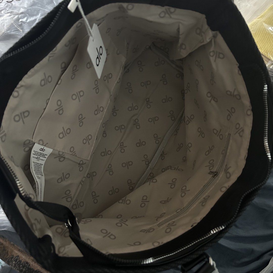 Alo Medium Shoulder Bag (Category: Shoulder Bags) located in Davao. Submitted by aki312.0704 (Listing ID 1445179165, Image 2). Description: BNew: Black, Beige, and Yellow still available Multiple zippers and compartments 17in x 11in Location: Davao DM for questions.