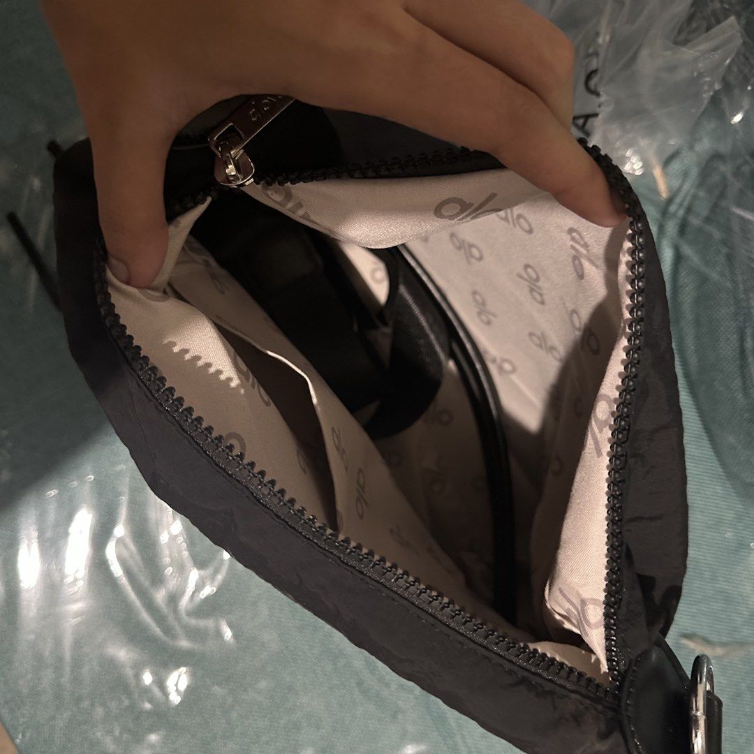 Alo Small Tote Bag (Category: Cross-body Bags) located in Davao. Submitted by aki312.0704 (Listing ID 1445179164, Image 2). Description: BNew: Black, Beige, and Pink still available Multiple zippers and compartments 11in x 10in Location: Davao DM for questions.