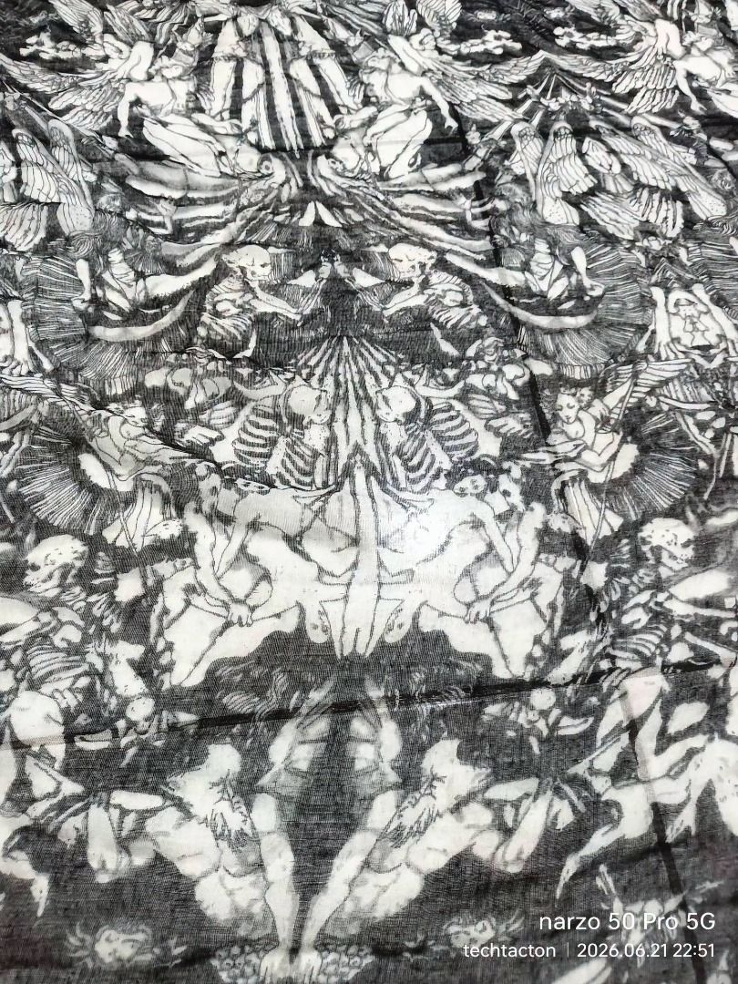 Angel and Demons Scarf random brand (Category: Scarves) located in Santo Tomas. Submitted by pickers_corner (Listing ID 1445201870, Image 3). Description: - Lightweight scarf with a detailed black and white graphic print. - Features a repeating pattern of skeletal figures and angelic beings. - Measures approximately [insert length] by [insert width]. - Can be styled in many ways. - Adds a unique touch to any outfit..