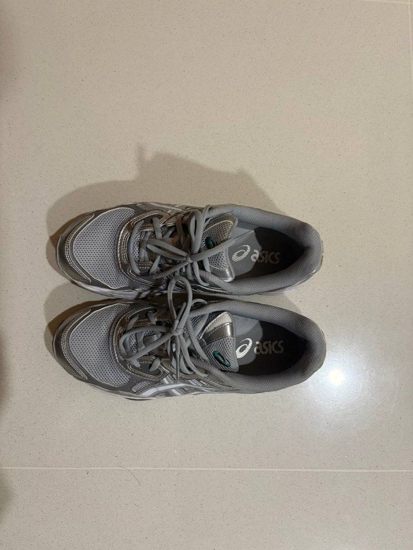 ASICS GEL NYC Men's Shoes (Category: Sneakers) located in Singapore. Submitted by tartarsauceu (Listing ID 1445197729, Image 2). Description: - ASICS GEL NYC men’s running shoes - Color: Silver and White - Breathable mesh upper - Cushioned sole with GEL technology - Versatile: suitable for workouts or casual wear - Condition: Good. No box - Open to negotiations .