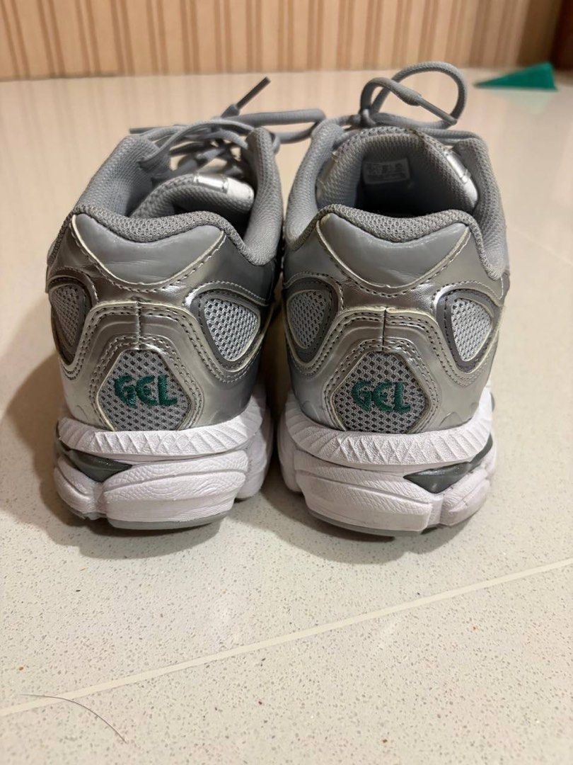 ASICS GEL NYC Men's Shoes (Category: Sneakers) located in Singapore. Submitted by tartarsauceu (Listing ID 1445197729, Image 3). Description: - ASICS GEL NYC men’s running shoes - Color: Silver and White - Breathable mesh upper - Cushioned sole with GEL technology - Versatile: suitable for workouts or casual wear - Condition: Good. No box - Open to negotiations .