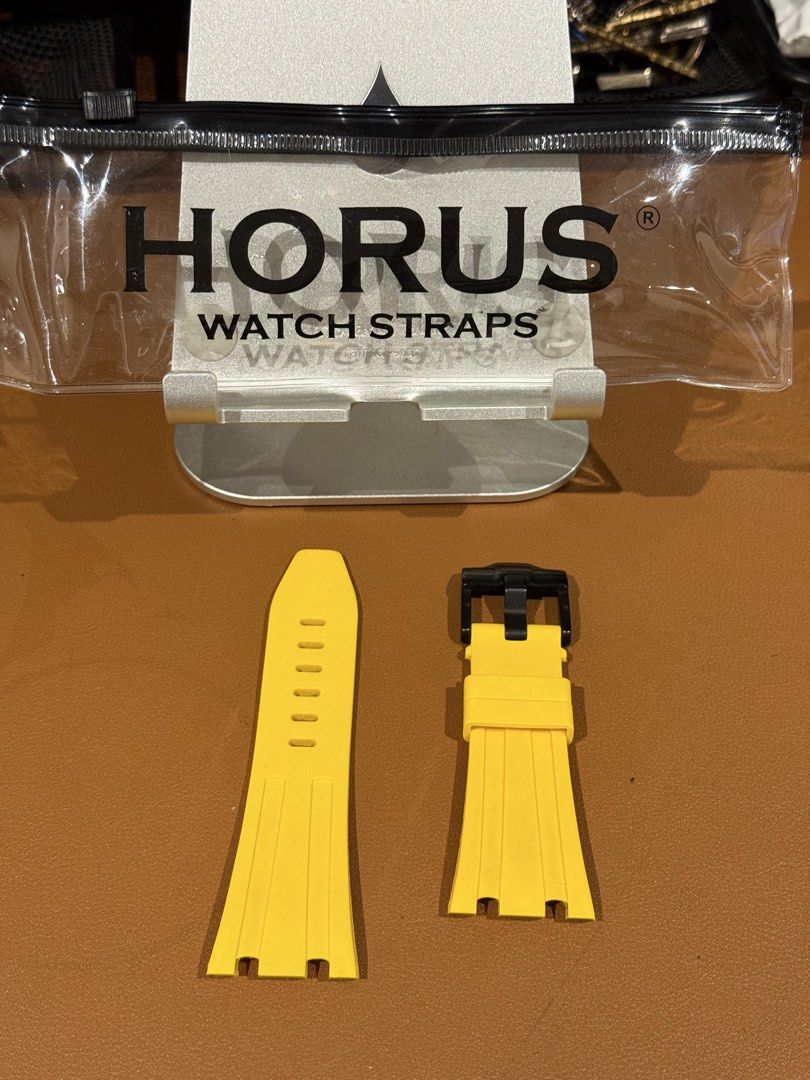 Audemars Piguet Horus Watch Yellow Rubber (Category: Men's Watches) located in Mandaluyong City. Submitted by plp_sgn (Listing ID 1445079315, Image 2). Description: Audemers Piguet ROO Yellow rubber watch strap from Horus. Comes with a black buckle clasp. Strap length is 125mm on the long side and 80mm on the short side. Original packaging included..