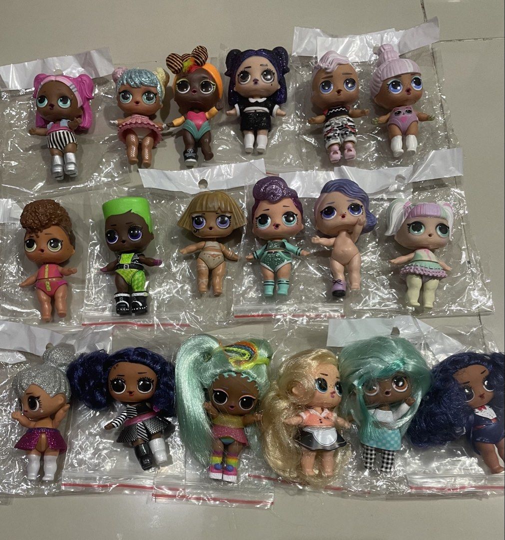 Authentic LOL Dolls Assorted Bundle (+ Freebie) (Category: Kids Toys) located in Manila. Submitted by prelovedpicksph (Listing ID 1445193620, Image 3). Description: - in good condition, minimal flaws - bundle contains 35 pcs of assorted LOL dolls from different series - includes authentic LOL storage/luggage case as a freebie (see pictures 6-7 for references) **sold as set only.