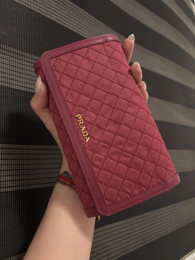 Authentic prada wallet on sling (Category: Luxury Bags & Wallets) located in Subic. Submitted by loveforluxe. (Listing ID 1445162467, Image 2). Description: Prada wallet on sling detachable .