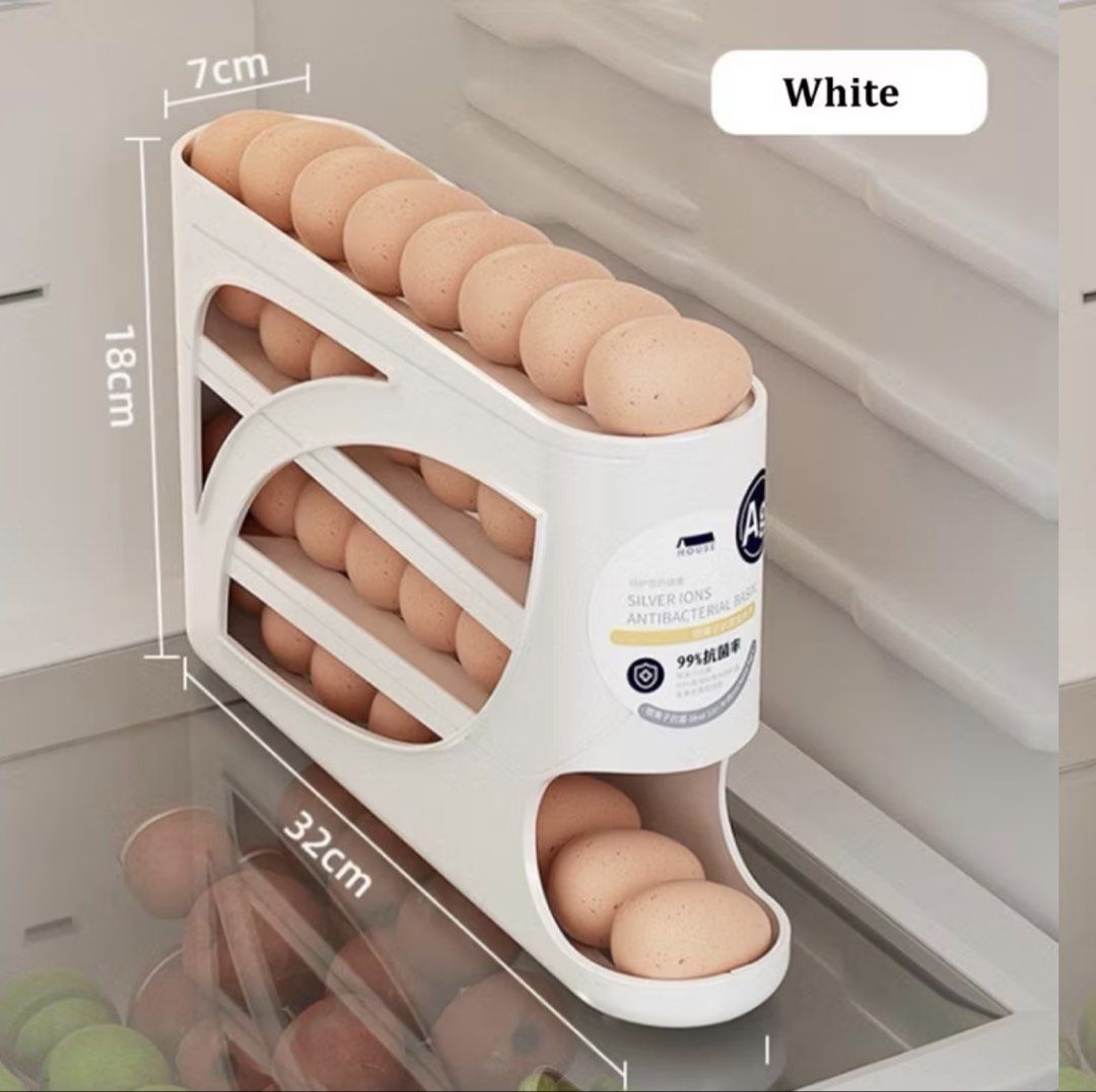 Automatic egg roller (Category: Shelves, Cabinets & Racks) located in Singapore. Submitted by frostyberry (Listing ID 1445198526, Image 1). Description: Automatic Gravity Roll: The sloped track design allows eggs to automatically roll forward down the ramp, ensuring your eggs are always right at your fingertips. Ultra-Slim Space-Saving Fit: At just 7cm wide, its compact, multi-layered profile fits perfectly into the narrow door shelves or tight c