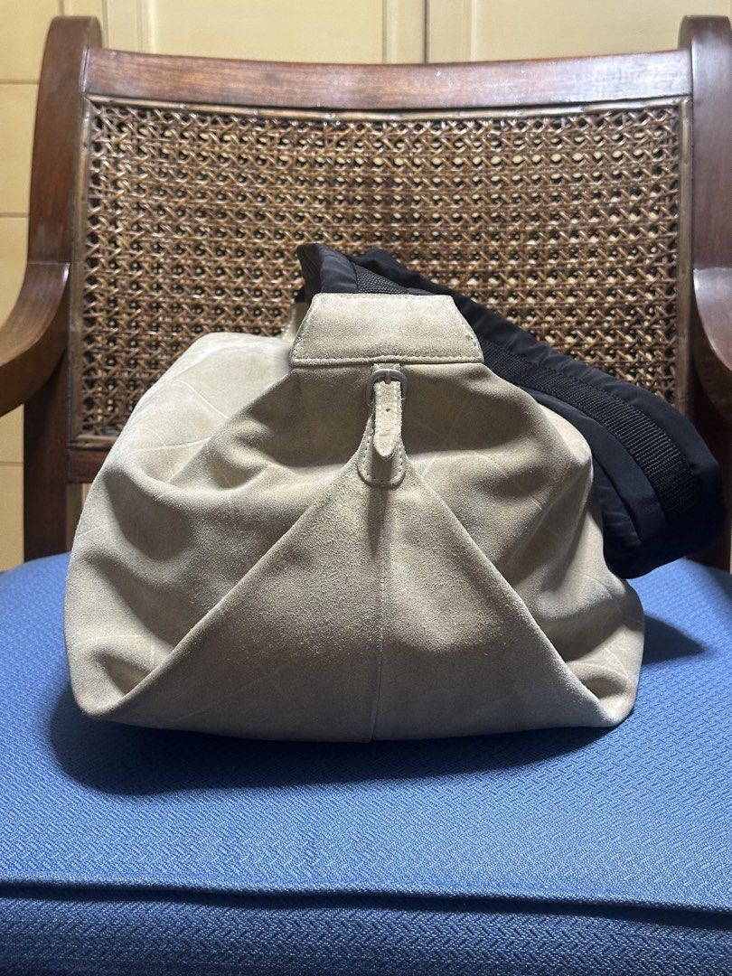 Chanel Beige Suede Shoulder Bag (Category: Luxury Bags & Wallets) located in Mandaluyong City. Submitted by marceditems (Listing ID 1445185120, Image 3). Description: - Chanel beige suede shoulder/crossbody bag - Series 5 hologram intact and Japan boutique seal intact - Quilted pattern stitching - Black fabric strap - Secure top zipper closure - Soft and slouchy silhouette - Ideal for everyday wear - Spacious interior for your essentials -Needs s