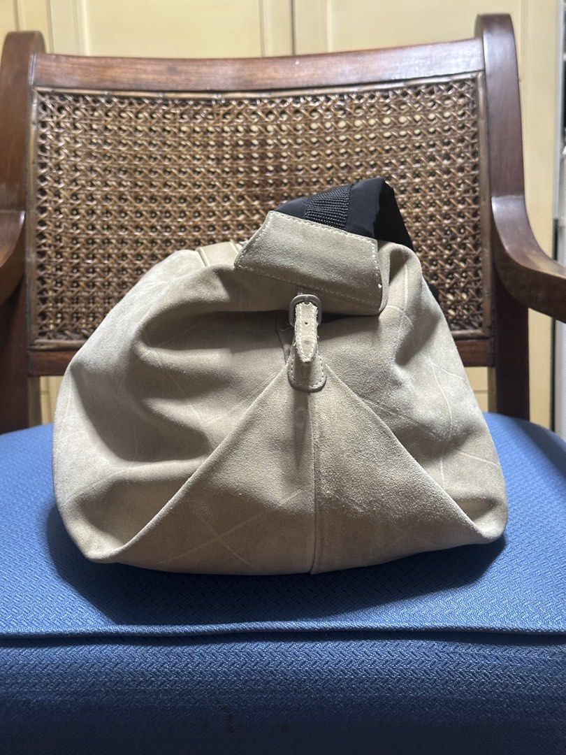Chanel Beige Suede Shoulder Bag (Category: Luxury Bags & Wallets) located in Mandaluyong City. Submitted by marceditems (Listing ID 1445185120, Image 2). Description: - Chanel beige suede shoulder/crossbody bag - Series 5 hologram intact and Japan boutique seal intact - Quilted pattern stitching - Black fabric strap - Secure top zipper closure - Soft and slouchy silhouette - Ideal for everyday wear - Spacious interior for your essentials -Needs s