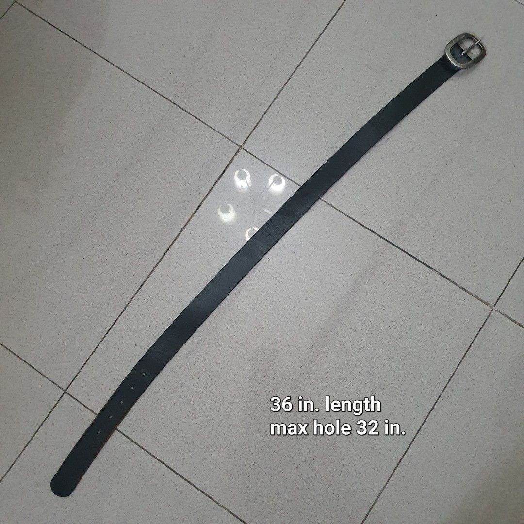 Black Leather Belt with Silver Buckle (Category: Belts) located in Paranaque City. Submitted by cobien (Listing ID 1445219719, Image 1). Description: - Classic black leather belt - Silver oval buckle - Total length: 36 inches - Fits waist sizes up to 32 inches - Versatile and perfect for everyday wear - Please check photos for condition details.