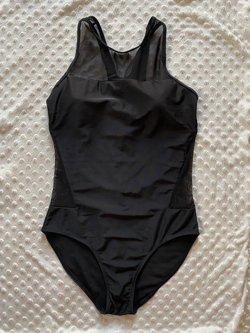 Black Mesh One-Piece Swimsuit with Cutout Back (Category: Bikinis & Swimsuits) located in Calamba. Submitted by iam.hides (Listing ID 1445172379, Image 1). Description: - Sleek black one-piece swimsuit - Features stylish mesh paneling on sides and upper chest - Open cutout detail at the back for a flattering look - Built-in bra cups provide comfortable support - Ideal for swimming, beach days, or lounging by the pool - Combines comfort and a fash