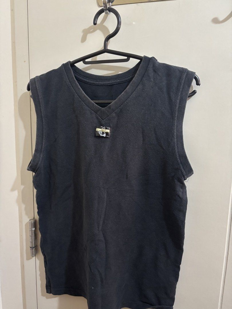 Black Sleeveless V-Neck Top with "SIMONE" Logo Patch alternative (Category: Sleeveless) located in Manila. Submitted by declutterrinmanila (Listing ID 1445143879, Image 1). Description: - Black sleeveless top - V-neckline - Small embroidered "SIMONE" logo patch on chest - Textured fabric for a unique look - Perfect for layering or wearing alone - Simple and versatile wardrobe staple 🩷 Price negotiable Sf should be shouldered by buyer.