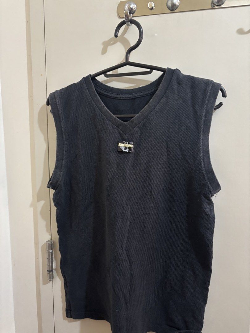 Black Sleeveless V-Neck Top with "SIMONE" Logo Patch alternative (Category: Sleeveless) located in Manila. Submitted by declutterrinmanila (Listing ID 1445143879, Image 2). Description: - Black sleeveless top - V-neckline - Small embroidered "SIMONE" logo patch on chest - Textured fabric for a unique look - Perfect for layering or wearing alone - Simple and versatile wardrobe staple 🩷 Price negotiable Sf should be shouldered by buyer.