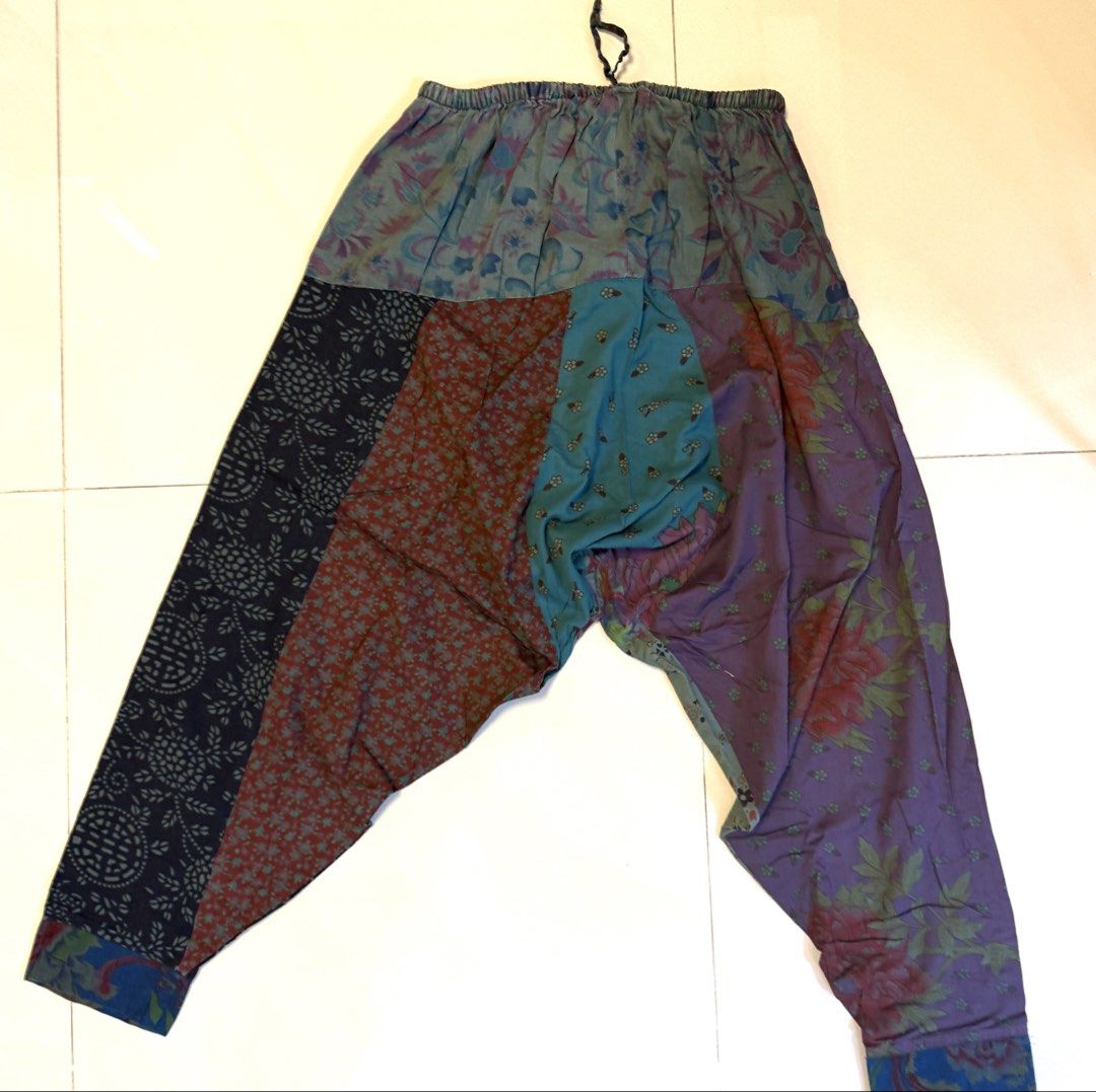 Boho Patchwork Harem Pants (Category: Jeans & Leggings) located in Singapore. Submitted by ju_souq (Listing ID 1445187608, Image 1). Description: - Unique patchwork design with vibrant colors and patterns - Comfortable elastic waistband with adjustable drawstring - Rekax fit for ultimate comfort - Ideal for casual wear, lounging, or music festivals - One size fits most - $12 each .