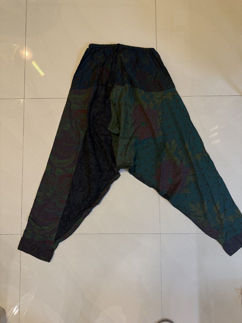 Boho Patchwork Harem Pants (Category: Jeans & Leggings) located in Singapore. Submitted by ju_souq (Listing ID 1445187608, Image 3). Description: - Unique patchwork design with vibrant colors and patterns - Comfortable elastic waistband with adjustable drawstring - Rekax fit for ultimate comfort - Ideal for casual wear, lounging, or music festivals - One size fits most - $12 each .