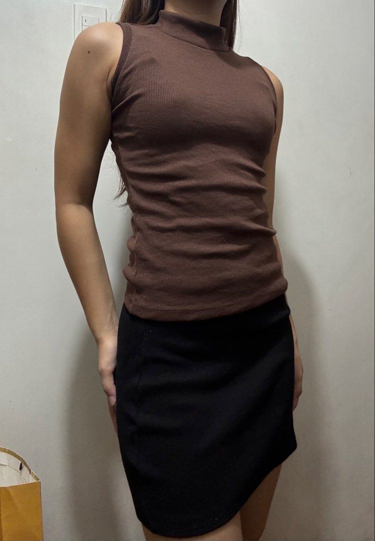 BUNDLE!! Brown Sleeveless Turtleneck Top & Black Mini Skirt (Category: Sets or Coordinates) located in Quezon City. Submitted by sctph2024 (Listing ID 1445075974, Image 1). Description: - Ribbed brown sleeveless turtleneck top -thick fabric -semi-stretchy Bust: 29-32” Waistline: 25-27” - Black ribbed mini skirt -see other post for measurements TOP ONLY: 150 .