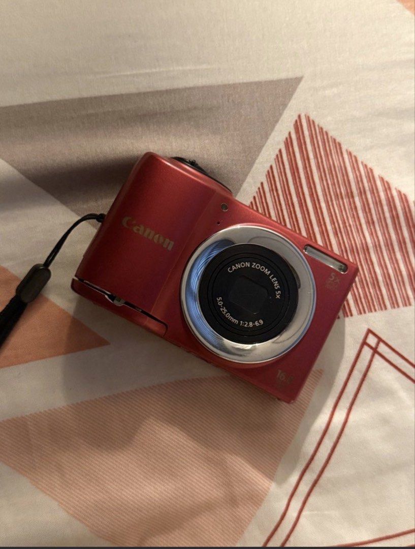 Canon PowerShot Digital Camera Red (Category: Cameras) located in San Simon. Submitted by shutyourself0101211 (Listing ID 1445084407, Image 1). Description: Canon Powershot A810 Digital Camera specs: • 16 megapixels • fully functional • CCD sensor • flash-working • 5x optical zoom (zoom in, zoom out) - working • modes (auto, program, live, digital IS, scene, movie) • scene selection (portrait, fireworks etc.) • effects (low light, fish eye, minia