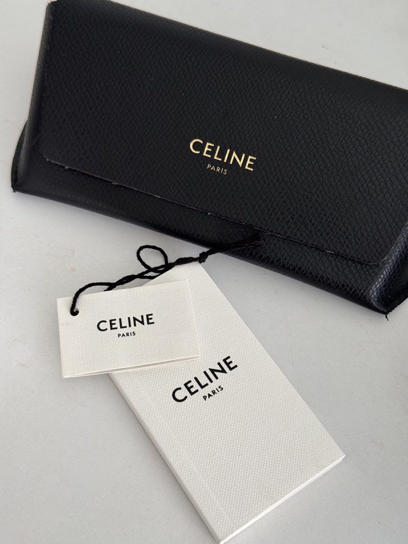 CELINE TRIOMPHE 01 SUNGLASSES IN ACETATE BLACK (Category: Sunglasses & Eyewear) located in Quezon City. Submitted by thegoodkind (Listing ID 1445045019, Image 3). Description: CELINE TRIOMPHE 01 SUNGLASSES IN ACETATE BLACK Barely using it (Tried to make it work on me but…) Little scratches but not visible when you wear it. Bought in Omotesando Tokyo. Comes with paper bag, box and receipt.