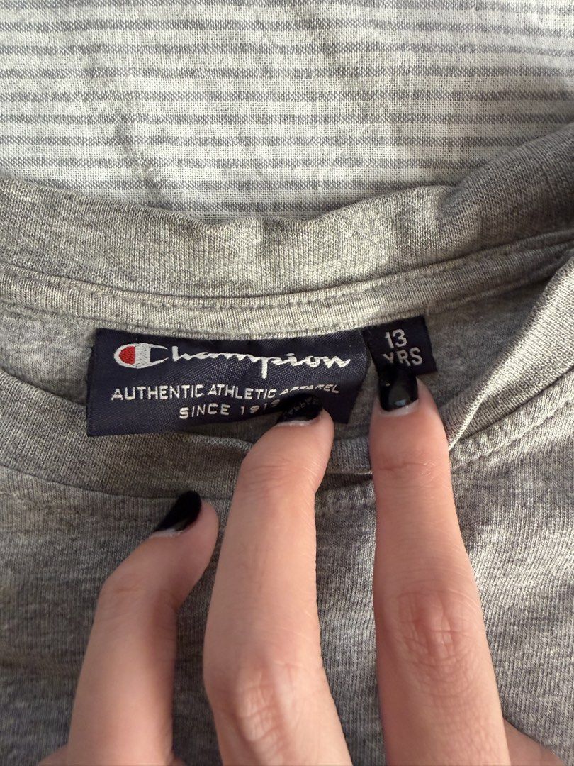 Champion Grey T-Shirt (Category: Shirts) located in Pasig City. Submitted by enneil (Listing ID 1445132017, Image 2). Description: vintage tshirt.