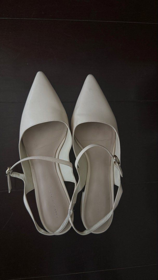 Charles & Keith Slingback Pointed Toe Flats (Tan, White, Black) Size 10 (Category: Flats & Sandals) located in Mandaluyong City. Submitted by _buymystuff_ (Listing ID 1445054049, Image 3). Description: Barely used Charles & Keith Slingback Flats I bought in 3 colors (Tan, Cream, Black). Used a few times for work, Super comfy and can be dressed up or down! Sizes: Tan - 39 White and Black - 40 450 each or 1200 if you buy all 3 colors :) RFS: downsi