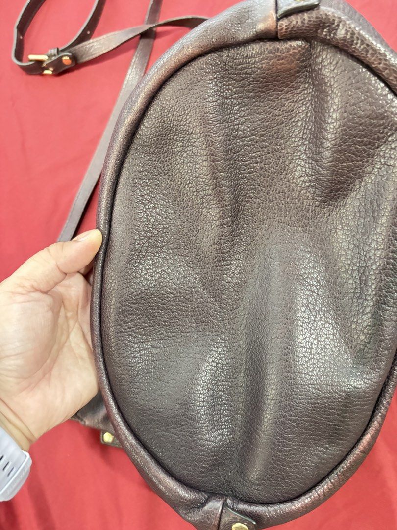 Chat Chat Dark Purple Leather Shoulder Bag (Category: Shoulder Bags) located in Los Banos. Submitted by tripleceedoubletwo (Listing ID 1445080929, Image 3). Description: - Dark purple leather shoulder bag - Zipper closure - Adjustable strap - Great for everyday use - Dimensions: 14 x 7 x 9.5 inches - MOP: Gcash / BPI.