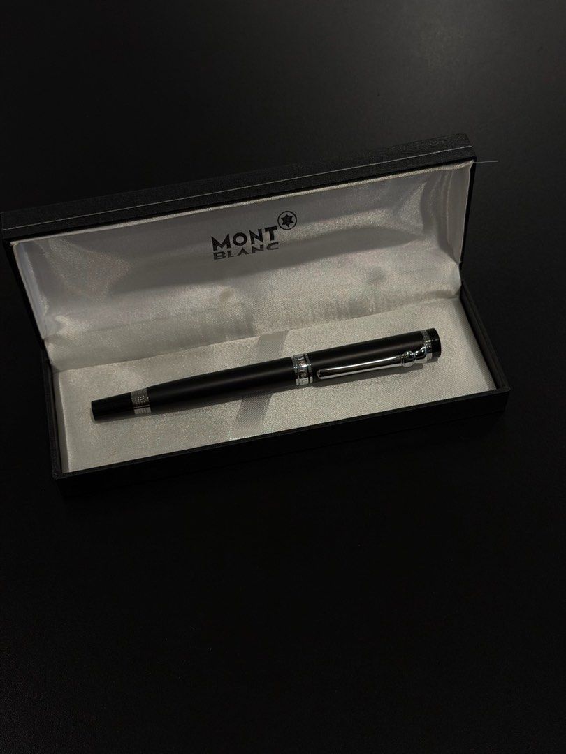 Classic Black Montblanc Pen with Box (Category: Luxury Accessories) located in Manila. Submitted by andwweee (Listing ID 1445161183, Image 1). Description: - Montblanc pen - Classic black finish with elegant silver accents - Comes with its original Montblanc box - Iconic Montblanc star logo prominently displayed on cap and top - Ideal for personal use or as a sophisticated gift - Feel free to ask any questions!.