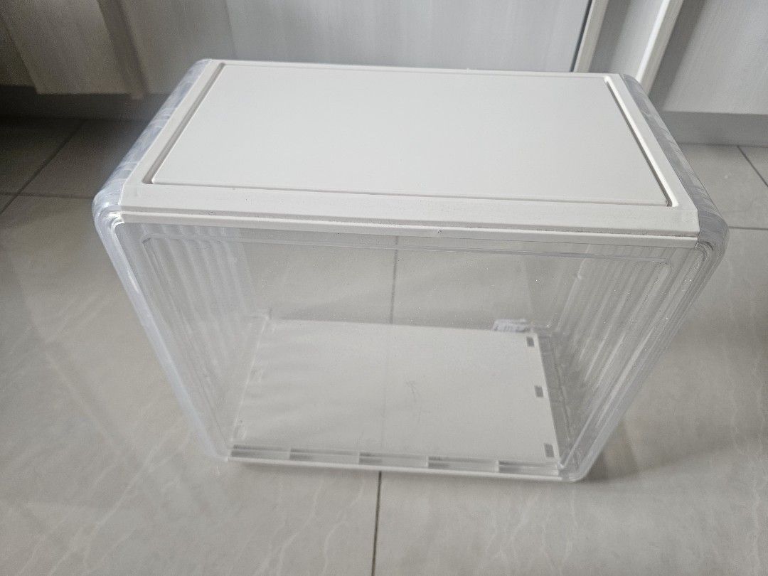 Clear Stackable Storage Boxes with Lids (Category: Storage Boxes & Baskets) located in Singapore. Submitted by happyhobbies (Listing ID 1445113318, Image 1). Description: - 3 Set of clear storage boxes(plastic) - Stackable design for efficient storage - size (each box) : about 17cm x 20cm x 33cm (height) - Each box comes with a lid - $7 each, set of 3 bozes for $20 - Ideal for organizing shoes, accessories, and small items - Transparent body allo