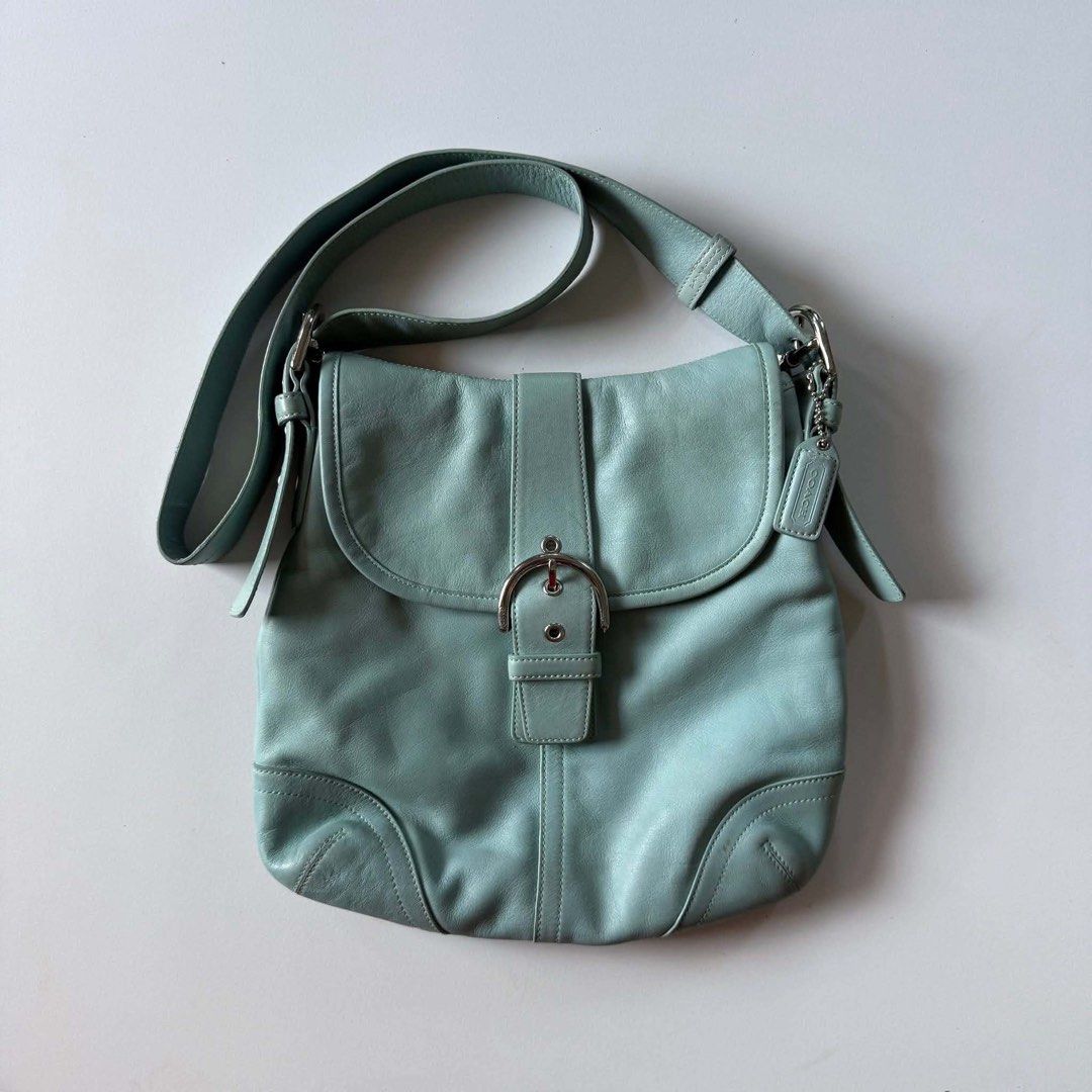 COACH LEATHER 9480 (Category: Cross-body Bags) located in Macabebe. Submitted by yourdita (Listing ID 1445230067, Image 3). Description: Authentic Coach 9840 rare baby blue 22 years old bag minimal issue seen on photo.