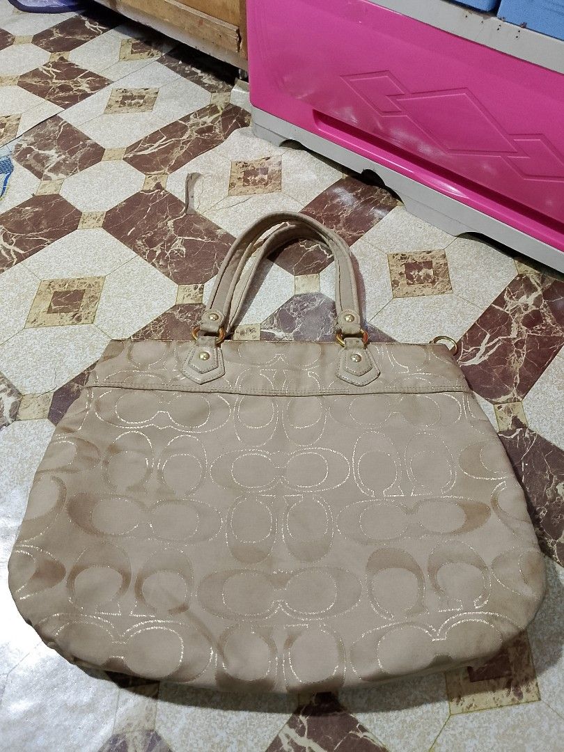 Coach Monogram Tote Bag Beige (Category: Everything Else Others) located in Manila. Submitted by caaths_collection (Listing ID 1445059066, Image 3). Description: - Coach monogram tote bag - Color: Beige - Classic all-over 'C' pattern - Zipper closure - Two shoulder straps - Interior lining: Light blue - Made in China - Ideal for everyday use - zipper ykk - pls see the picture para sa issue po.