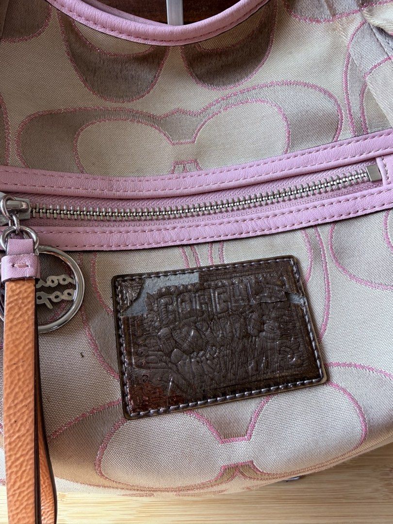 Coach Poppy Pink Shoulder Bag (Category: Luxury Bags & Wallets) located in San Jose del Monte. Submitted by heirloompeony (Listing ID 1445207683, Image 2). Description: CCH Poppy Signature Sateen Lurex Sling Bag 💝⭐️ *𝘤𝘩𝘢𝘳𝘮𝘴 𝘯𝘰𝘵 𝘪𝘯𝘤𝘭𝘶𝘥𝘦𝘥 🫧 Condition: 8/10 (Rank AB) • has minimal signs of wear and usage, dirt at bottom, cracked poppy tag, see slides: • spacious, can fit an ipad 11in • hot pink interior • silver hardware 📌 Discla