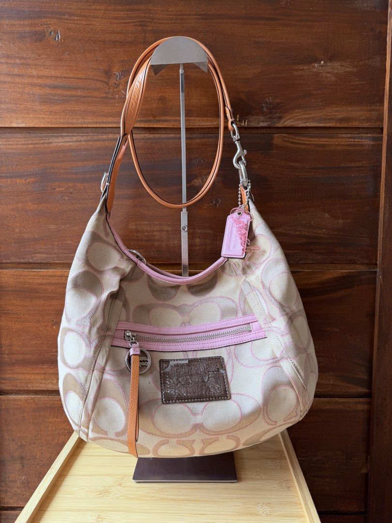 Coach Poppy Pink Shoulder Bag (Category: Luxury Bags & Wallets) located in San Jose del Monte. Submitted by heirloompeony (Listing ID 1445207683, Image 1). Description: CCH Poppy Signature Sateen Lurex Sling Bag 💝⭐️ *𝘤𝘩𝘢𝘳𝘮𝘴 𝘯𝘰𝘵 𝘪𝘯𝘤𝘭𝘶𝘥𝘦𝘥 🫧 Condition: 8/10 (Rank AB) • has minimal signs of wear and usage, dirt at bottom, cracked poppy tag, see slides: • spacious, can fit an ipad 11in • hot pink interior • silver hardware 📌 Discla
