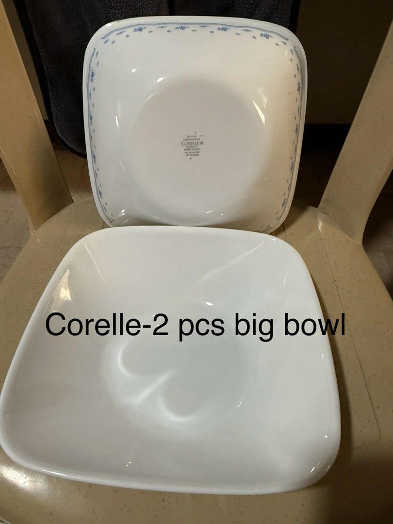 Corelle Square Plates and Bowls Set (Category: Dinnerware & Cutlery) located in Pasig City. Submitted by bianca005 (Listing ID 1445172927, Image 2). Description: - Corelle Dinnerware Set - Includes: 6 large square plates, 6 small plates, 2 large bowls, 3 small bowls - Color: White with a charming blue floral pattern - Features: Durable and lightweight - Ideal for: Everyday meals and special occasions - Sold as a set; Not individually.