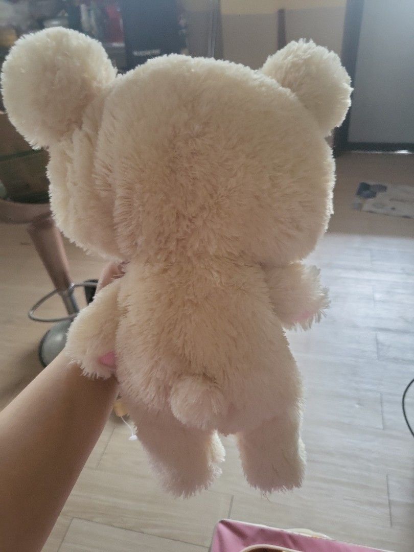Cream Bear Plush Toy with Red Button Detail (Category: Plushies & Soft Toys) located in Caloocan City. Submitted by lynette1977 (Listing ID 1445122868, Image 2). Description: - Super soft cream bear plush toy - Adorable pink accents on ears and paws - Features a cute red button on its tummy - Ideal for cuddling or as a charming decoration - Compact size, fits easily in a bag.
