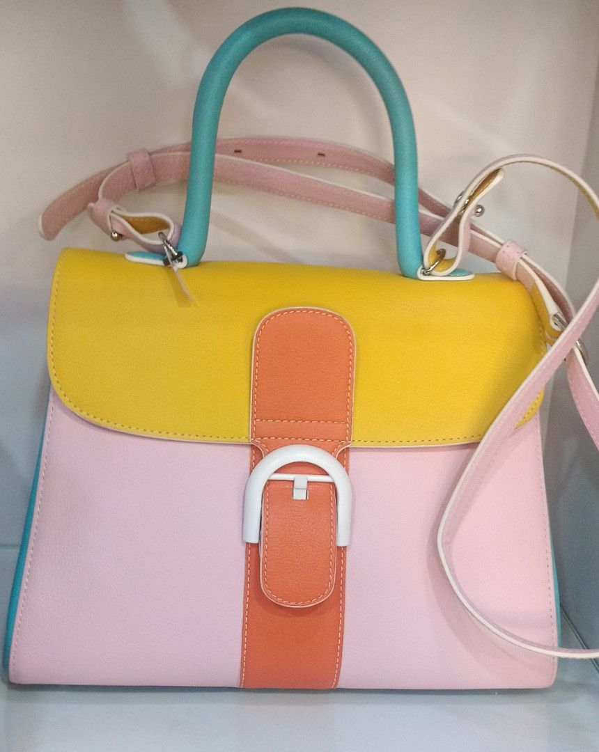 Delvaux Multicolor Leather Handbag (Category: Luxury Bags & Wallets) located in Legazpi City. Submitted by georgepineda791 (Listing ID 1445158731, Image 1). Description: ✨ Preloved Delvaux Two-Way Bag ✨ An elegant and sophisticated Delvaux bag crafted from quality leather inside and out. Made in France, this luxurious piece showcases exceptional craftsmanship and timeless style. Its beautiful combination of colors makes it a standout accessory th