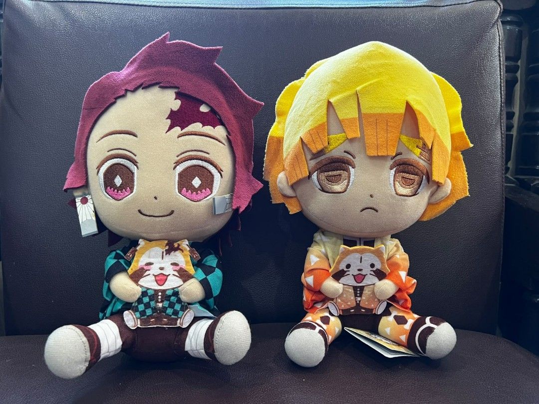 Demon Slayer Tanjiro & Zenitsu Plush Dolls (Category: Plushies & Soft Toys) located in Palayan City. Submitted by yourvintagesoul (Listing ID 1445086831, Image 1). Description: - Set of 2 Demon Slayer plush dolls - Includes Tanjiro Kamado and Zenitsu Agatsuma - Both plushies are in a sitting pose - Each doll is holding a small character - Original tags are attached - Ideal for anime fans and collectors -Price is still negotiable if your intrested