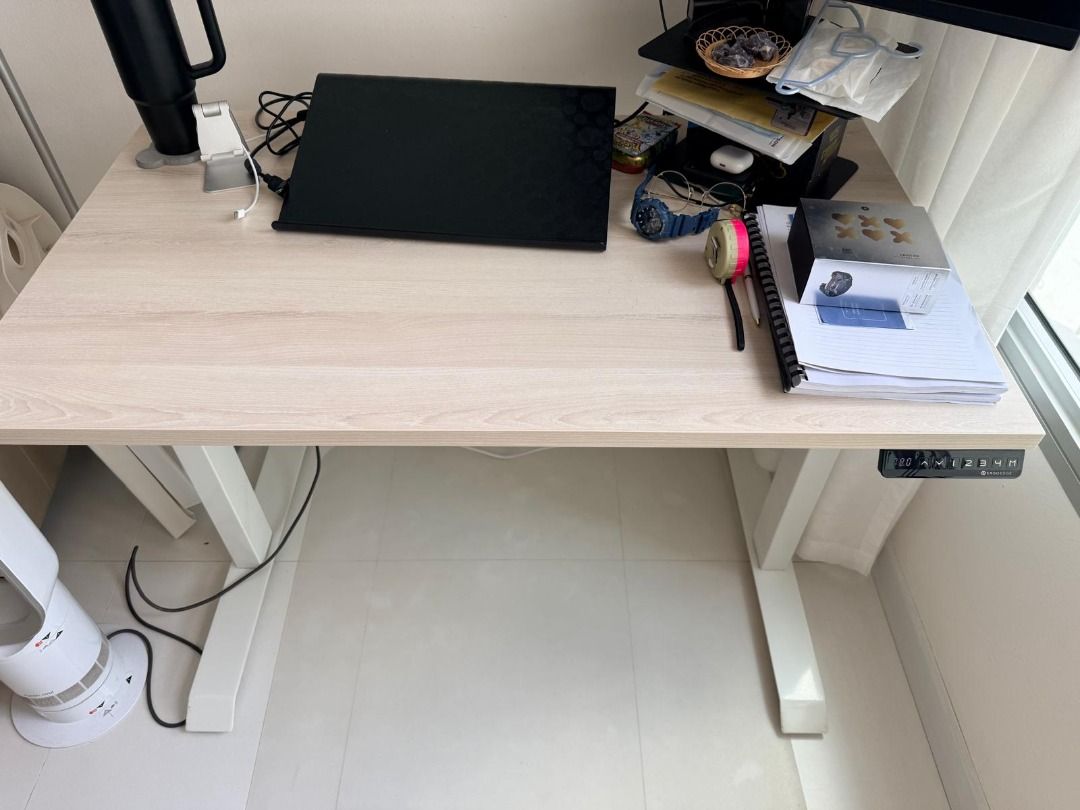 ErgoEdge Adjustable Work Desk (Electric) (Category: Tables & Sets) located in Singapore. Submitted by 50pkkm50 (Listing ID 1445191821, Image 2). Description: - Desk 110 x 65cm - Leg 69-118cm (Adjustable height settings) - Cable Management Tray.